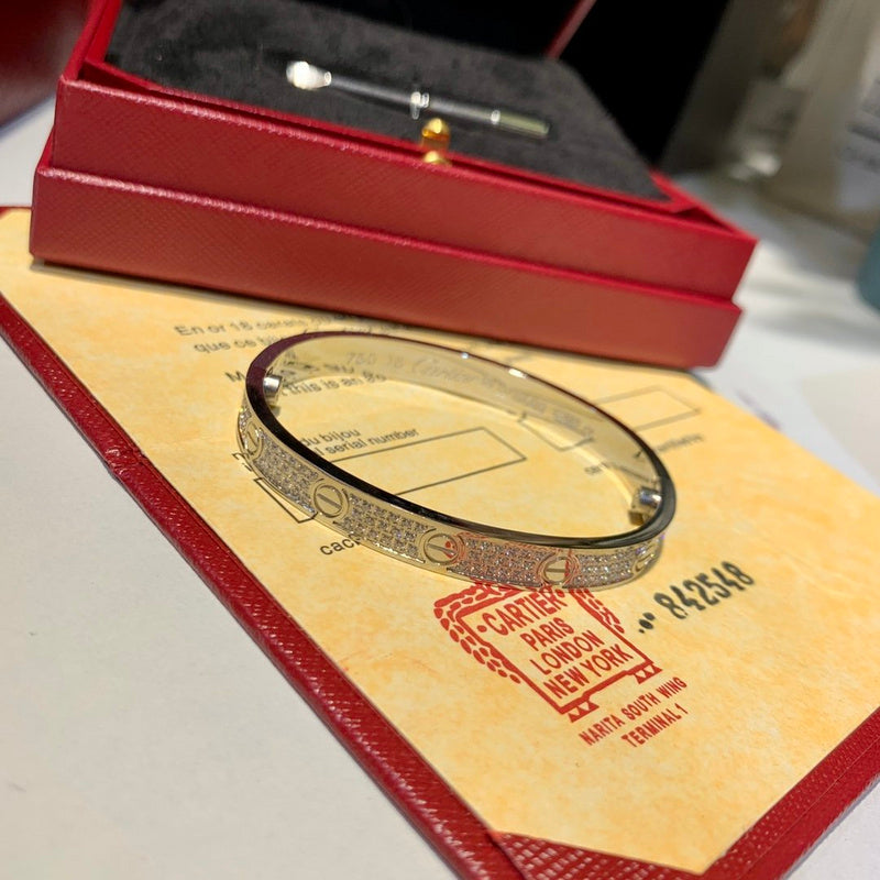 Angled view of Cartier unisex jewelry piece