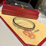 Angled view of Cartier unisex jewelry piece