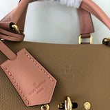 Back view of chic signature women's handbag – women's luxury handbag