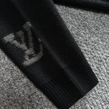 Back view of Louis Vuitton luxury clothing with signature branding