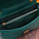 Handle and strap detail of everyday-luxe classic women's handbag – women's statement bag