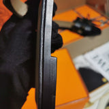 Hermès Tan Slide Sandals - Close-Up Texture View