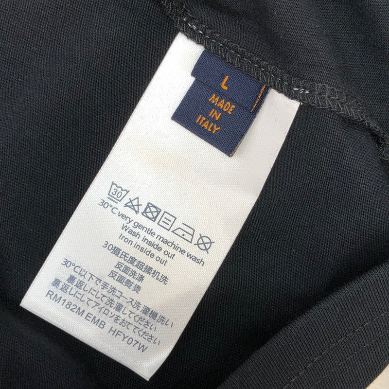 Flat lay presentation of Louis Vuitton cotton t-shirt with logo-detail design