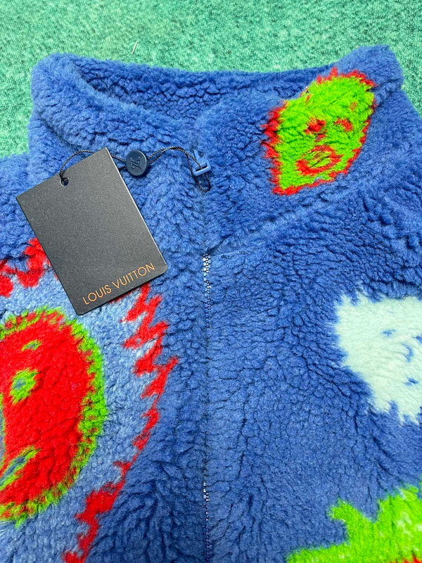 Close-up detail shot of Louis Vuitton luxury clothing with logo-detail design