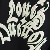 Side profile of Louis Vuitton luxury clothing with logo-detail design