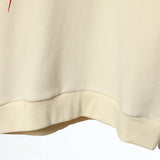 Flat lay presentation of Gucci luxury clothing with tailored silhouette