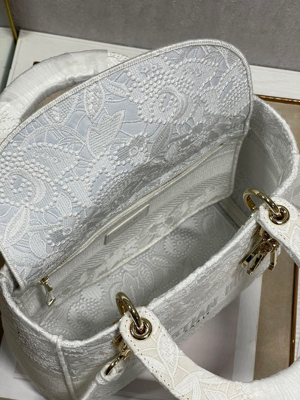 Top view of chic classic women's handbag – women's designer-style accessory