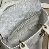 Top view of chic classic women's handbag – women's designer-style accessory