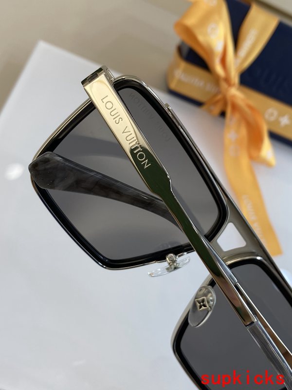Close-up detail view of Louis Vuitton unisex sunglasses