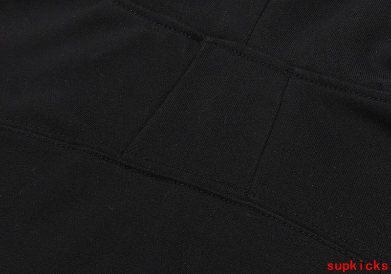 Close-up detail shot of Rhude luxury clothing with streetwear-inspired cut