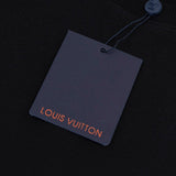 Full styled look of Louis Vuitton luxury clothing with label-forward styling