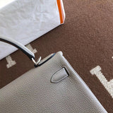 Side view of streamlined structured handbag