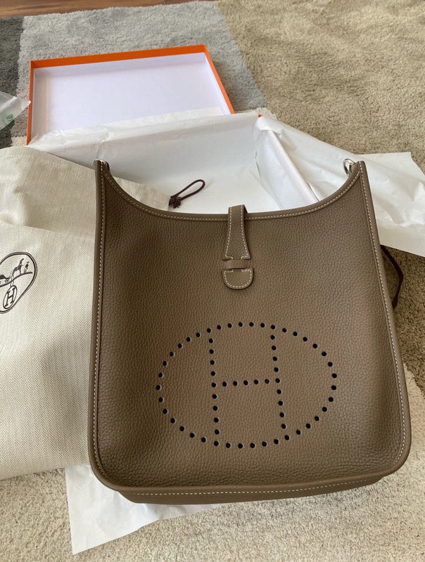 Side view of minimalist structured handbag