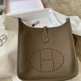 Side view of minimalist structured handbag