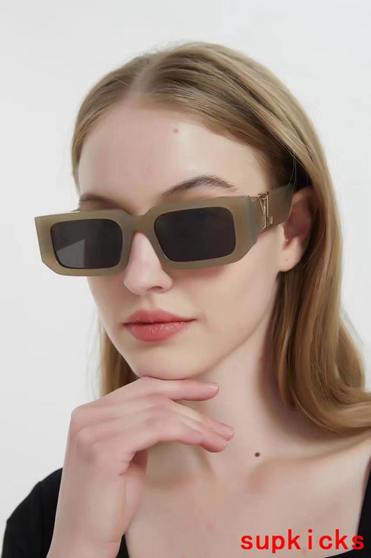 Close-up detail view of Louis Vuitton unisex sunglasses