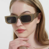Close-up detail view of Louis Vuitton unisex sunglasses