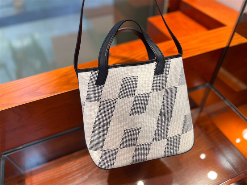 Side view of polished structured handbag