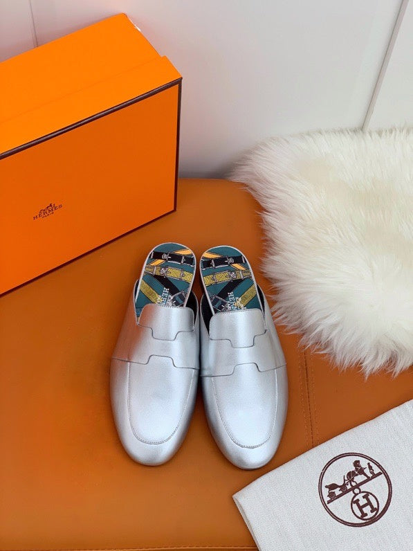 Hermès Black Loafer Flats - Angled View