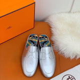 Hermès Black Loafer Flats - Angled View
