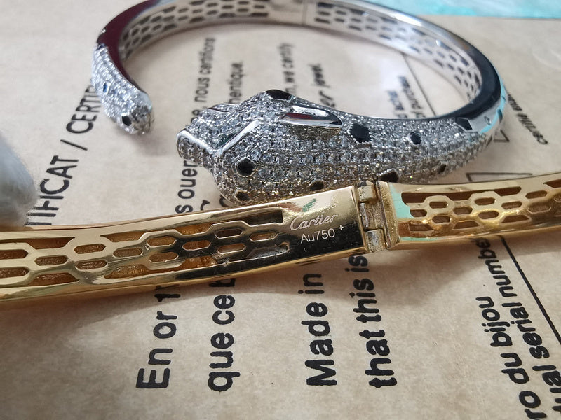 Angled view of Cartier unisex jewelry piece
