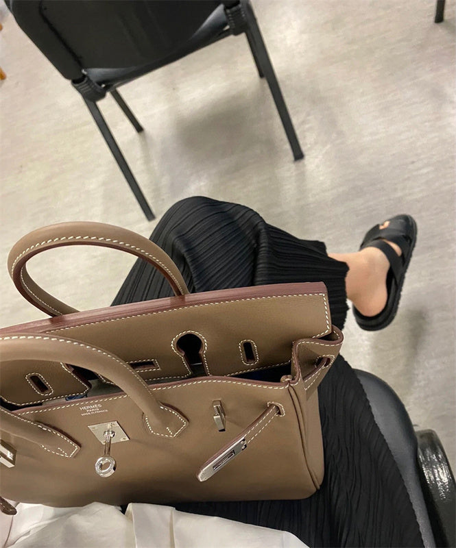 Side view of sophisticated structured handbag