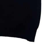 Side profile of Louis Vuitton luxury clothing with label-forward styling