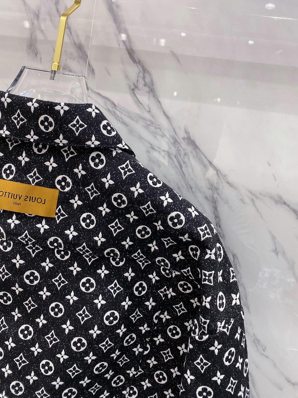 Side profile of Louis Vuitton luxury clothing with label-forward styling
