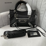 Zivas Charm Understated Luxury Statement Handbag (Signature Shape & Finish) – Angled View