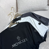Front view of Moncler luxury clothing with signature branding