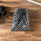 Side profile of Louis Vuitton luxury clothing with everyday silhouette