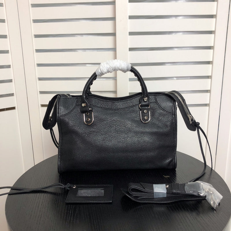 Front view of elevated modern women's handbag – women's statement bag