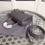 Styled lifestyle shot of elevated everyday-luxe women's handbag – women's designer-style accessory