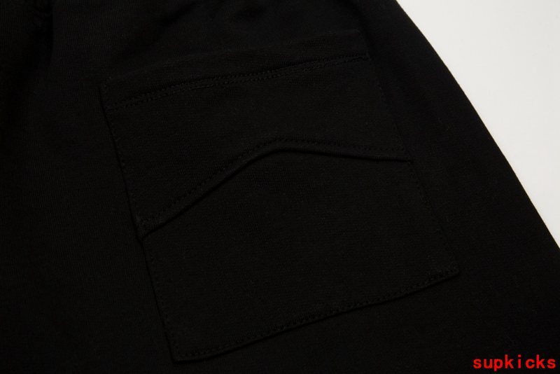 Side profile of Rhude luxury clothing with contemporary cut