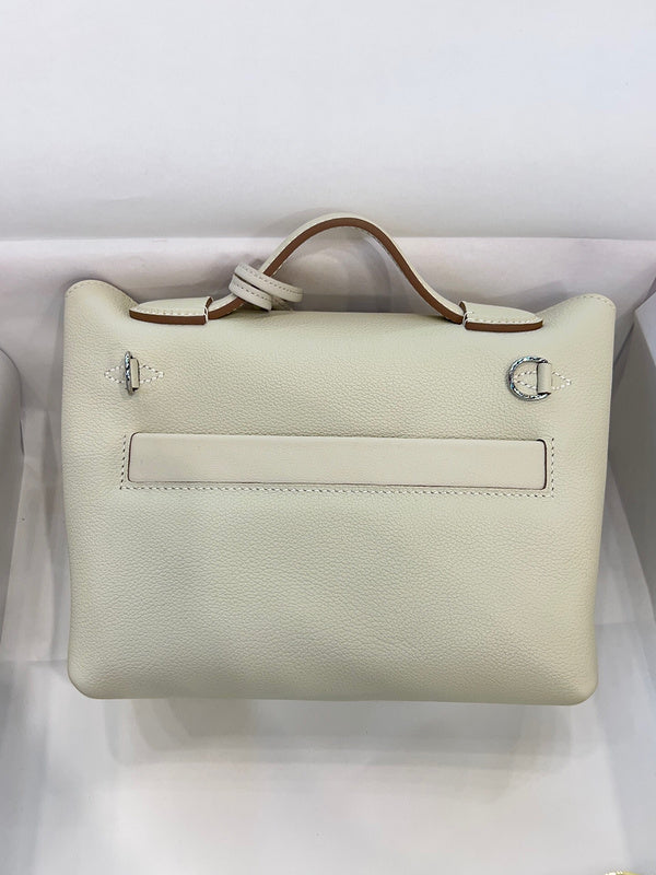 Side view of clean-lined structured handbag