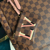 Close-up detail of classic signature women's handbag – women's luxury handbag