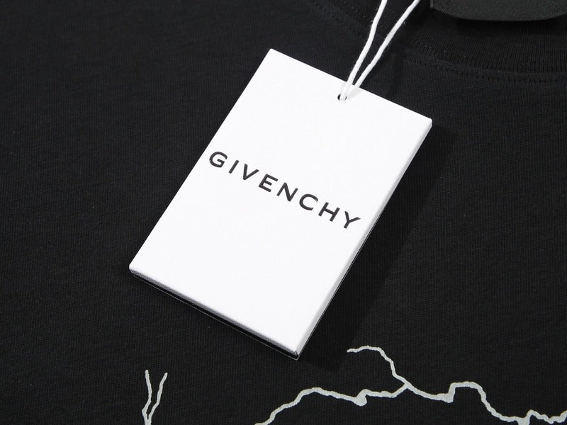 Flat lay presentation of Givenchy luxury clothing with monogram-inspired silhouette