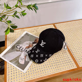 Close-up detail view of Louis Vuitton unisex cap