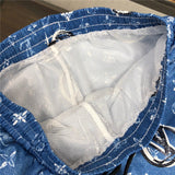 Flat lay presentation of Louis Vuitton cotton t-shirt with label-forward styling