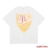 Back view of Rhude luxury clothing with monogram-inspired silhouette