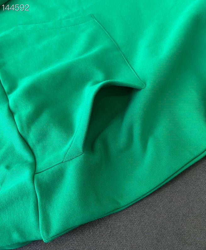Flat lay presentation of Louis Vuitton luxury clothing with everyday silhouette