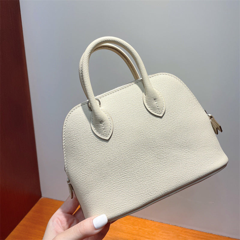 Close-up detail of poised bag design