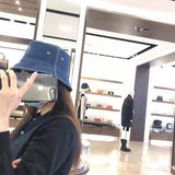 Side view of Burberry unisex cap