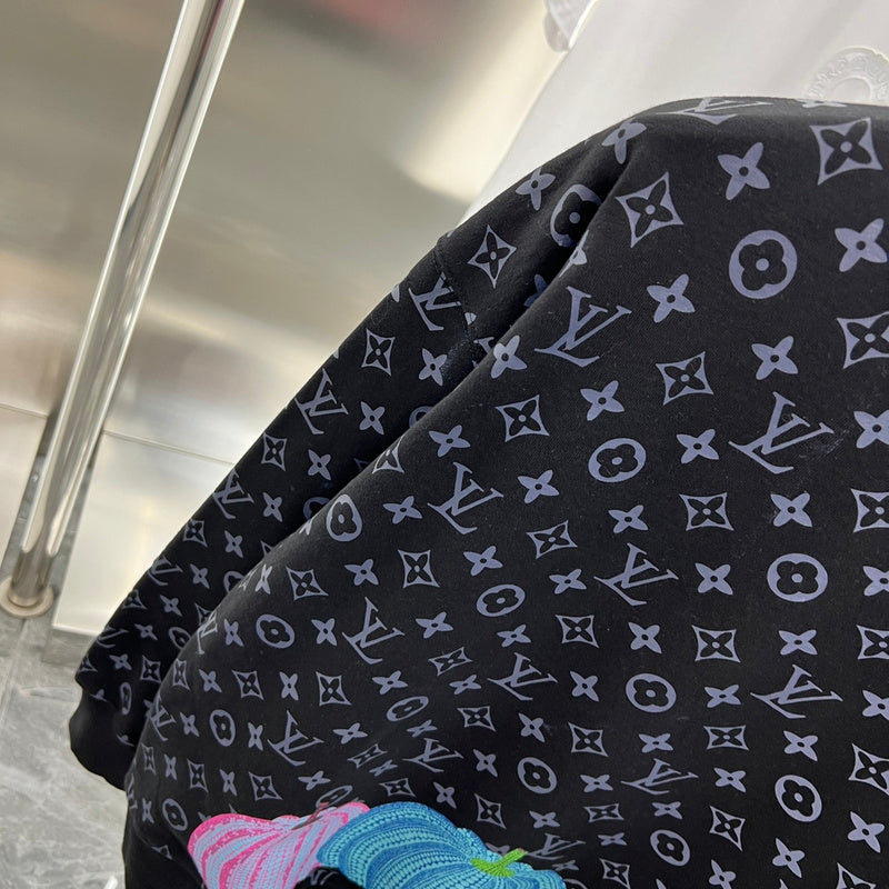 Front view of Louis Vuitton luxury clothing with tailored silhouette