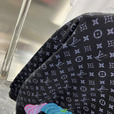 Front view of Louis Vuitton luxury clothing with tailored silhouette