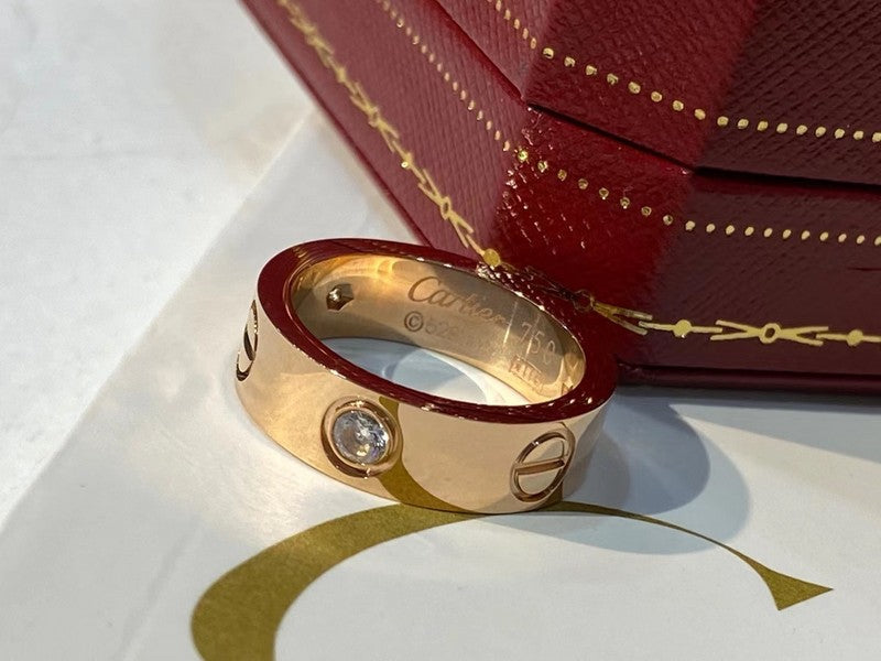 Angled view of Cartier unisex jewelry piece
