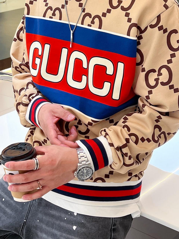 Close-up detail shot of Gucci luxury clothing with logo-detail design