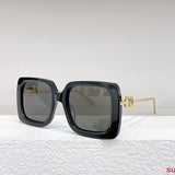 Close-up detail view of Louis Vuitton unisex sunglasses