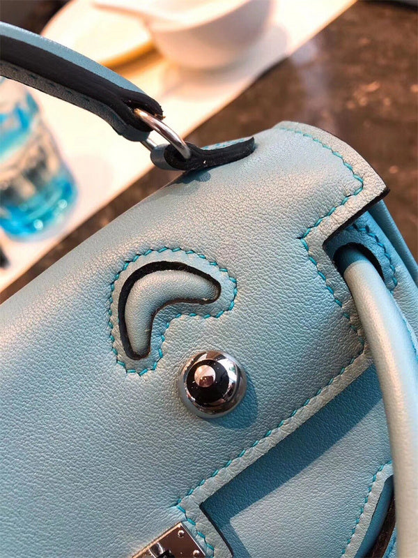 Side view of modernist structured handbag