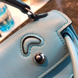 Side view of modernist structured handbag