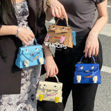 Side view of modernist structured handbag